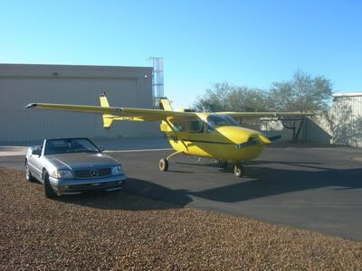 Cessna 337 Super Skymaster and Mercedes SL600.
