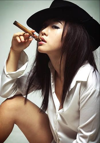 Woman smoking a cigar