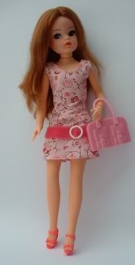 Auburn '80's doll wearing Ella fashion.