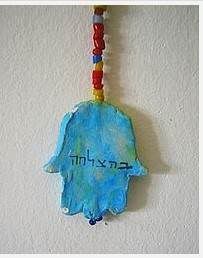 Clay Hamsa on a wall Clay Hamsa on a wall