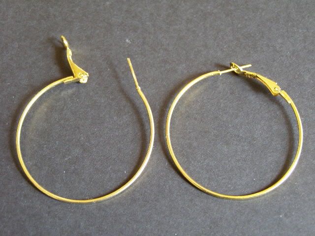 gold hoops with name. stating your name and the