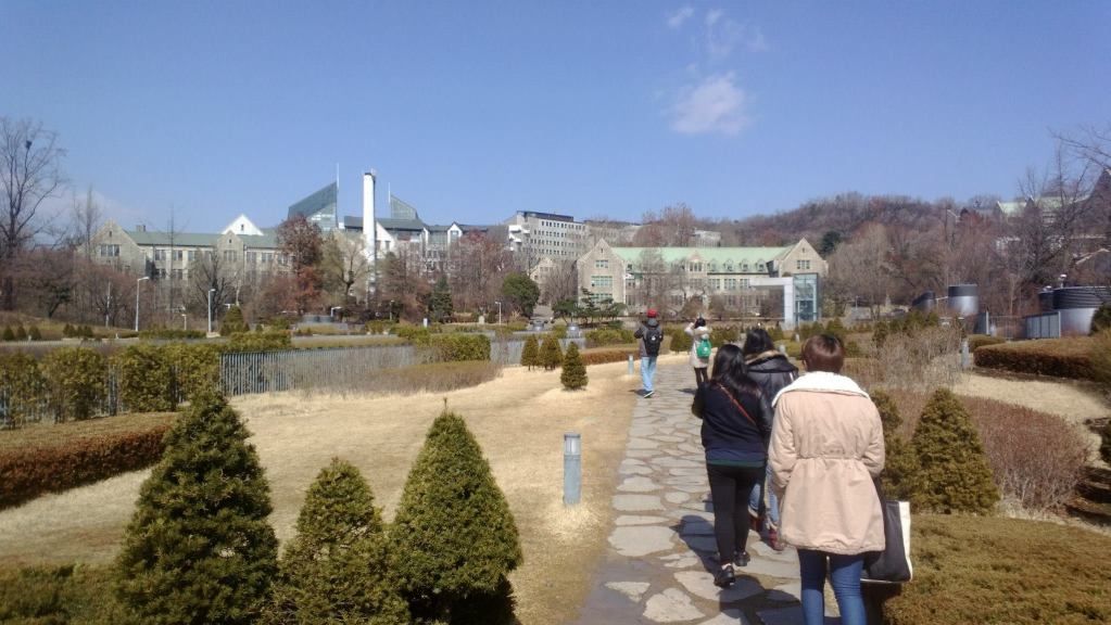 Part of the Ewha campus. Can't wait til spring! That is my roommate in the tan coat. We're on the hunt for lunch. photo 859319_10151378217177839_1953590506_o.jpg