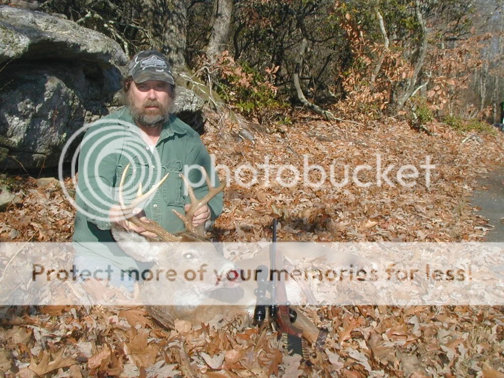 http://i149.photobucket.com/albums/s66/mox_ct/Hunting%202010/8Pointerd.jpg